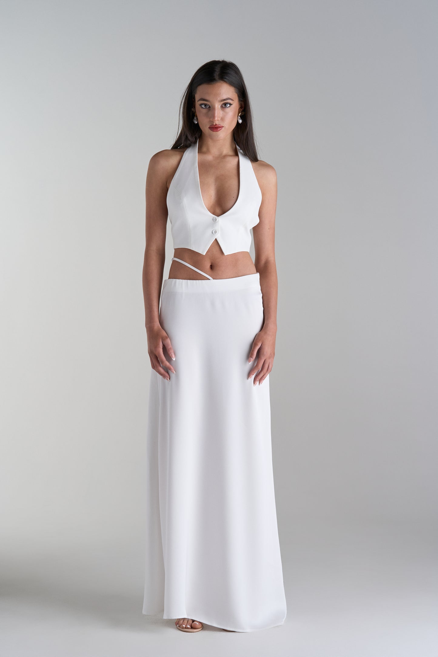 Model Wearing Two Piece Skirt and Top Set