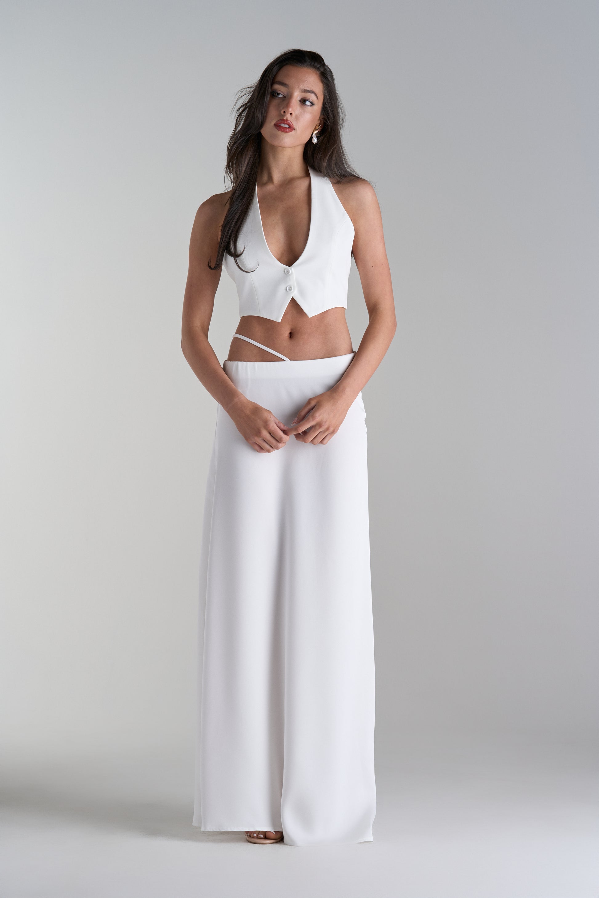 Model Wearing Two Piece Skirt and Top Set