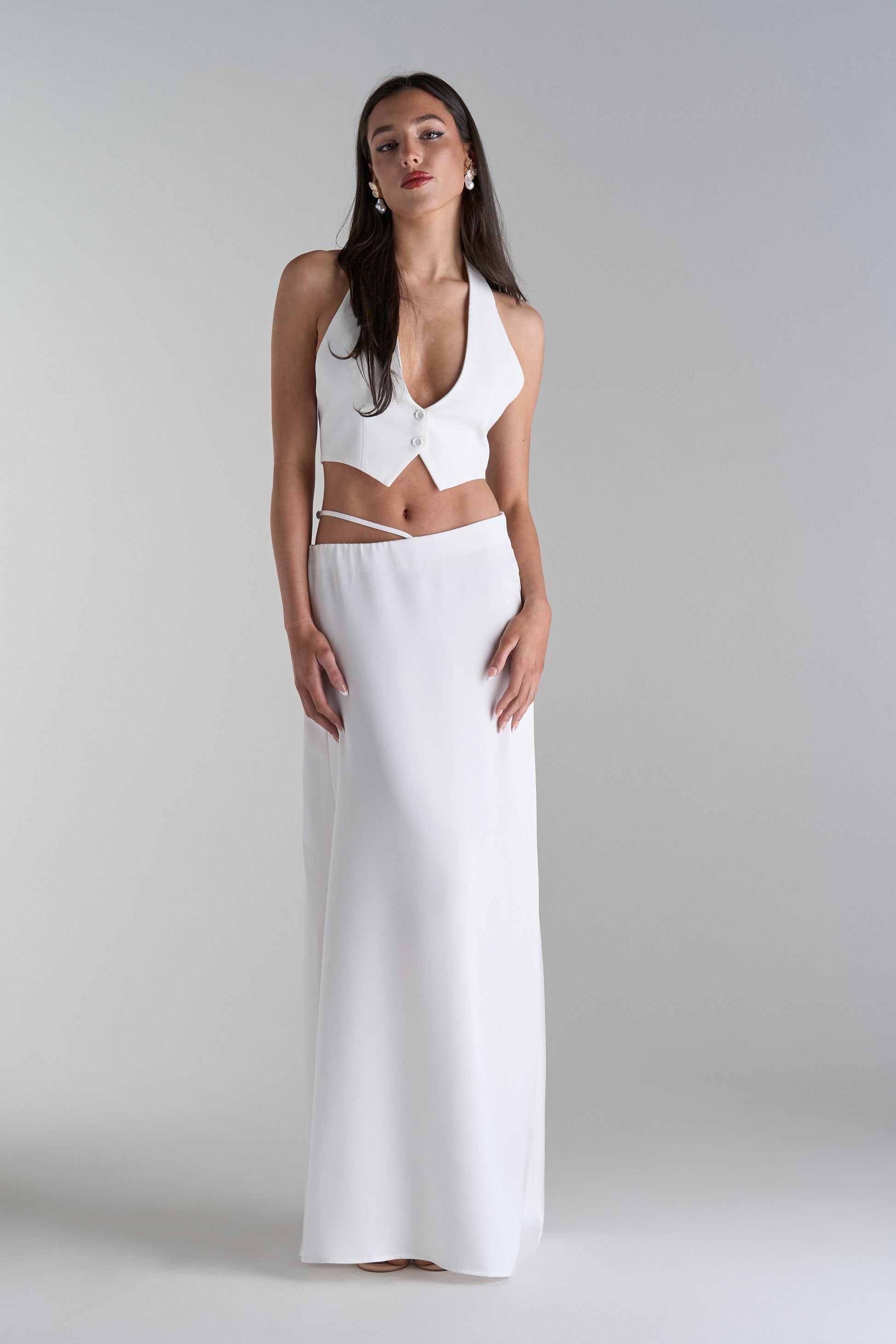 Model Wearing Two Piece Skirt and Top Set