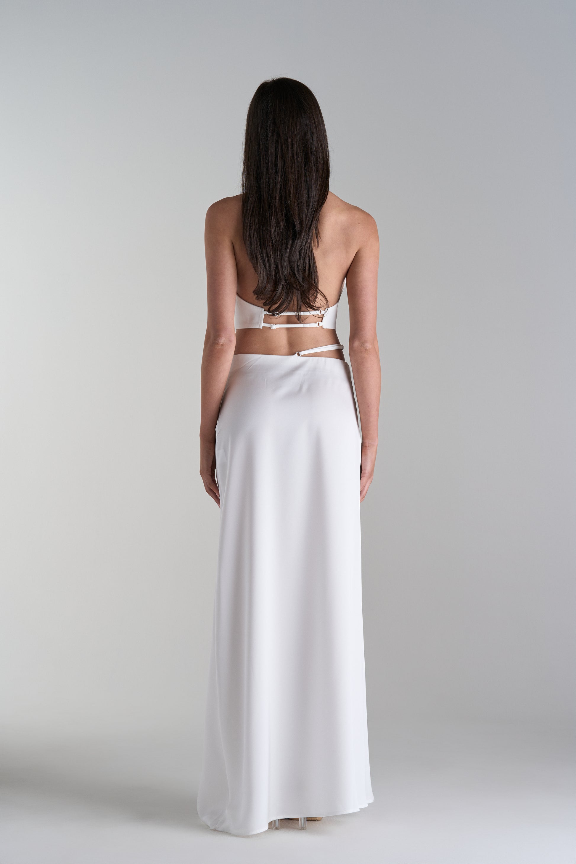 Model Wearing Two Piece Skirt and Top Set