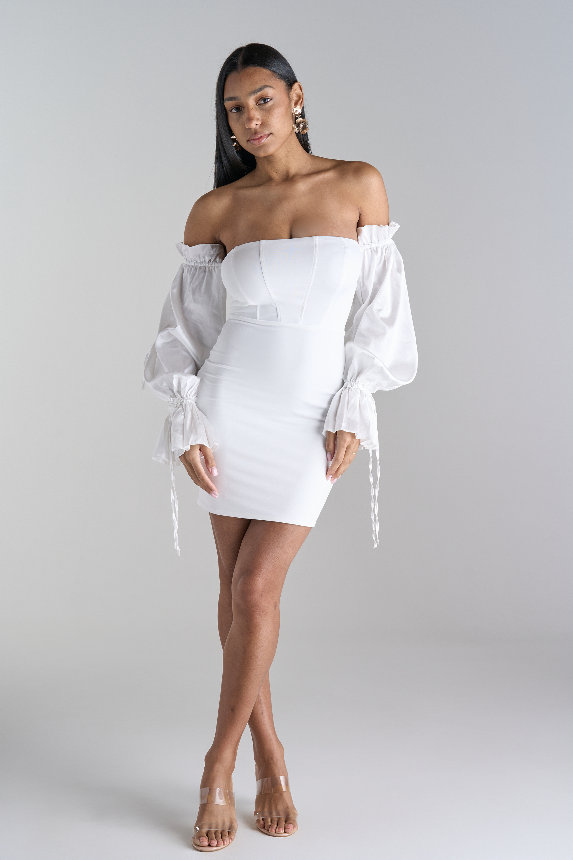 Model Wearing Off Shoulder White Mini Dress