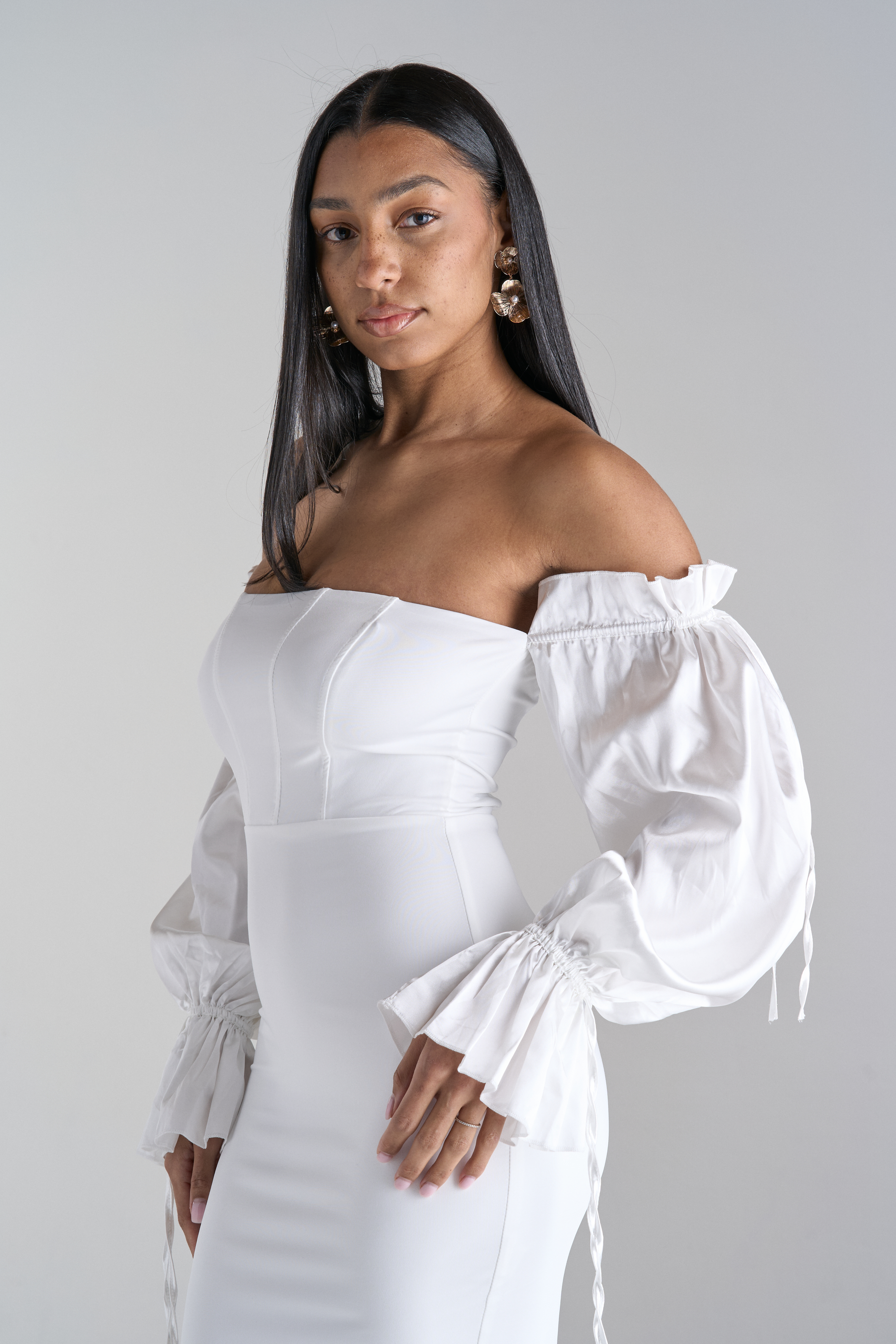 Model Wearing Off Shoulder White Mini Dress