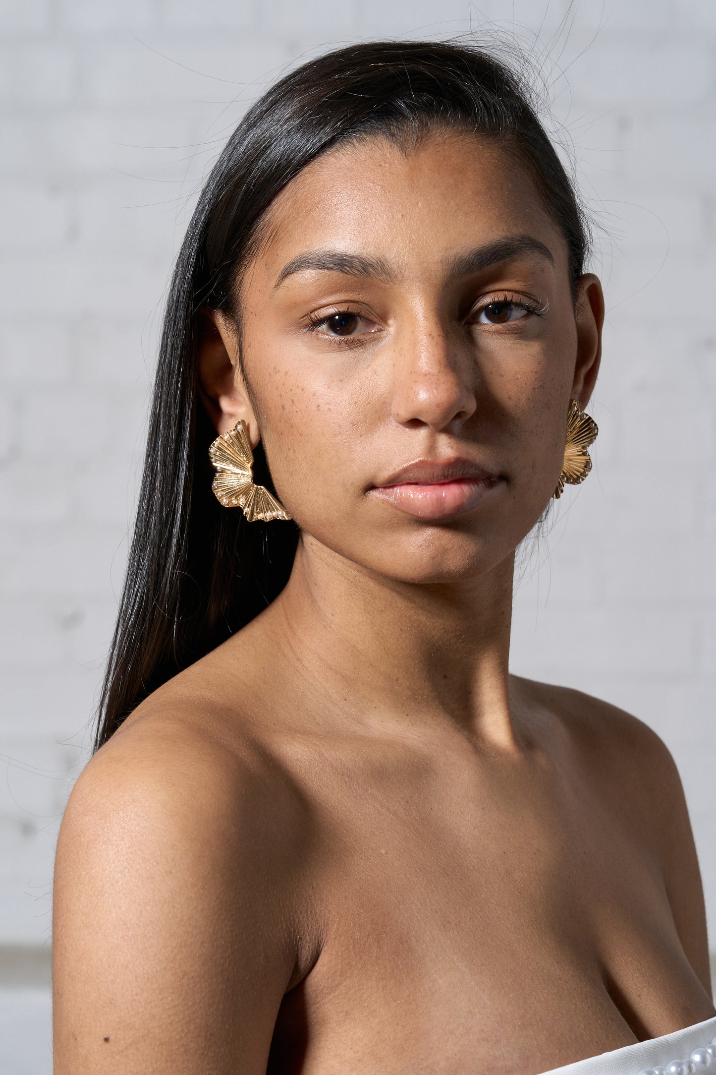 Model Wearing Two Halves Earrings