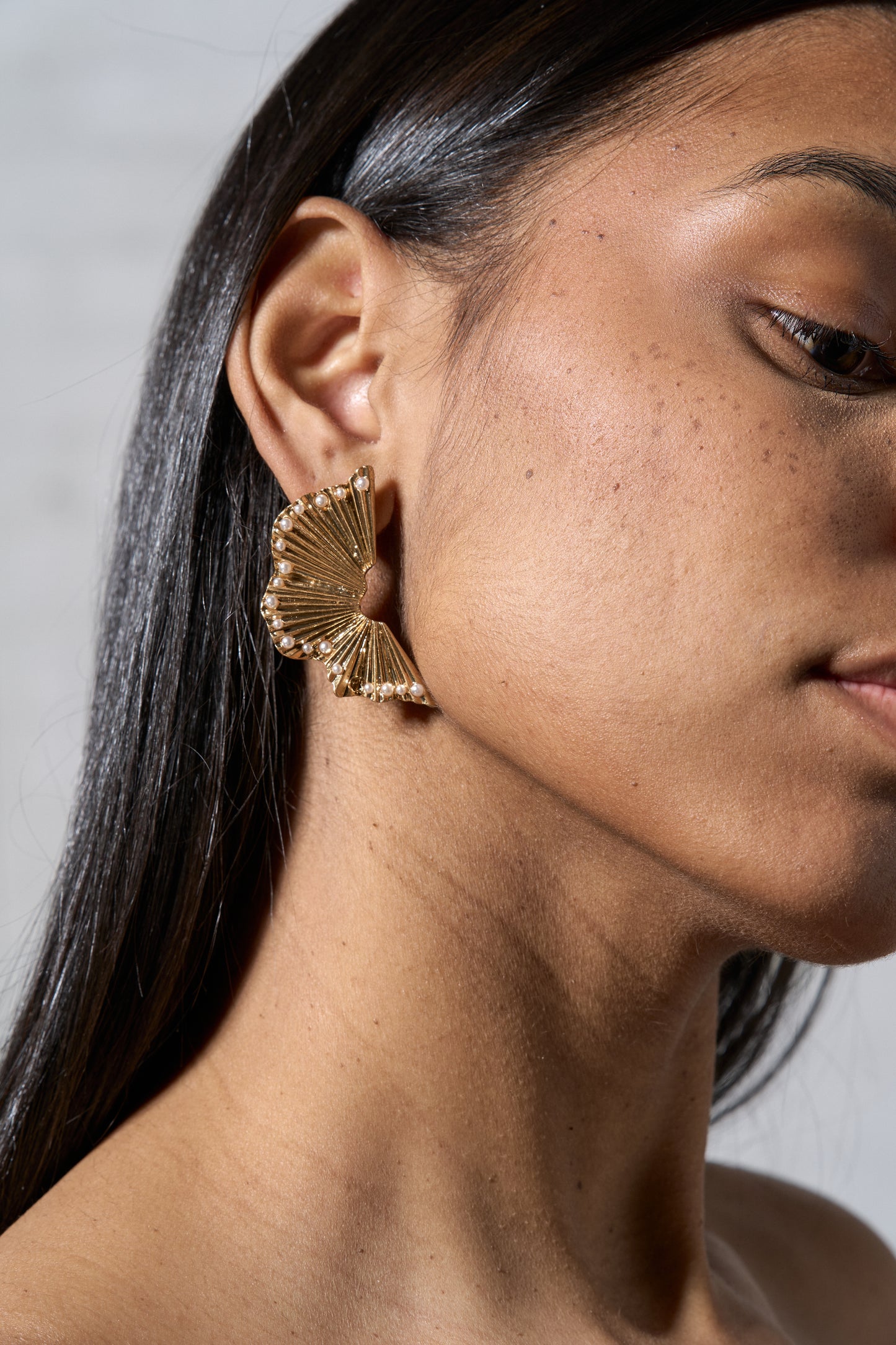 Model Wearing Two Halves Earrings - 2