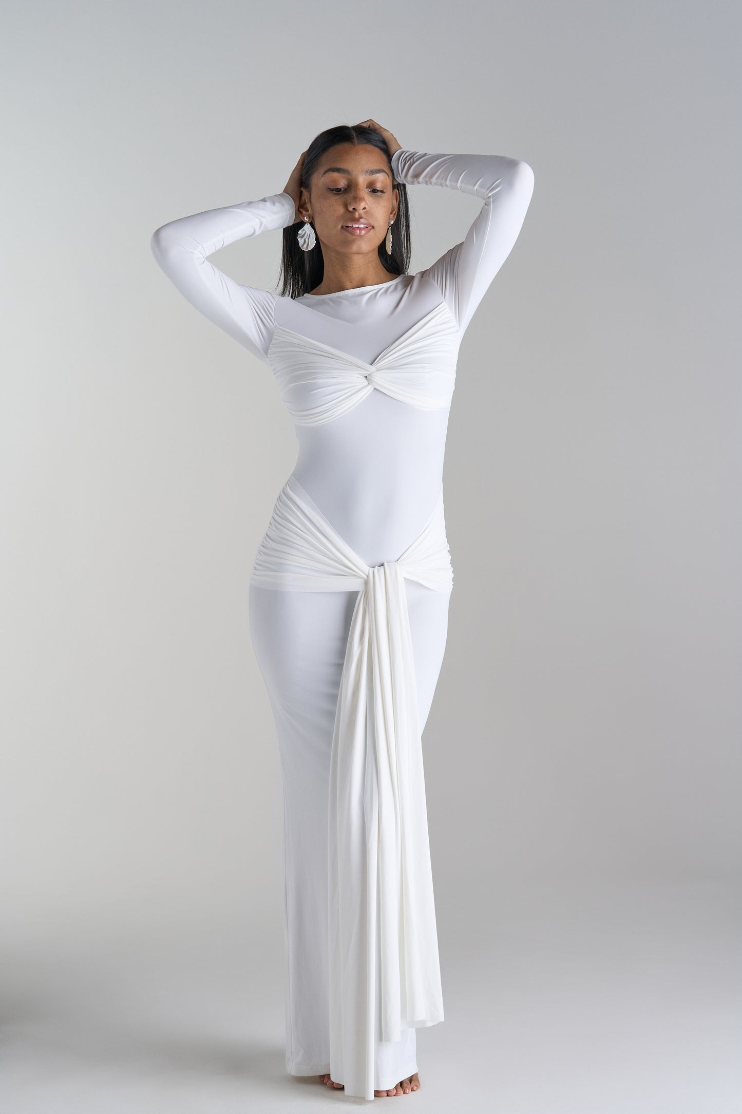 Model in Arielle Long White Dress