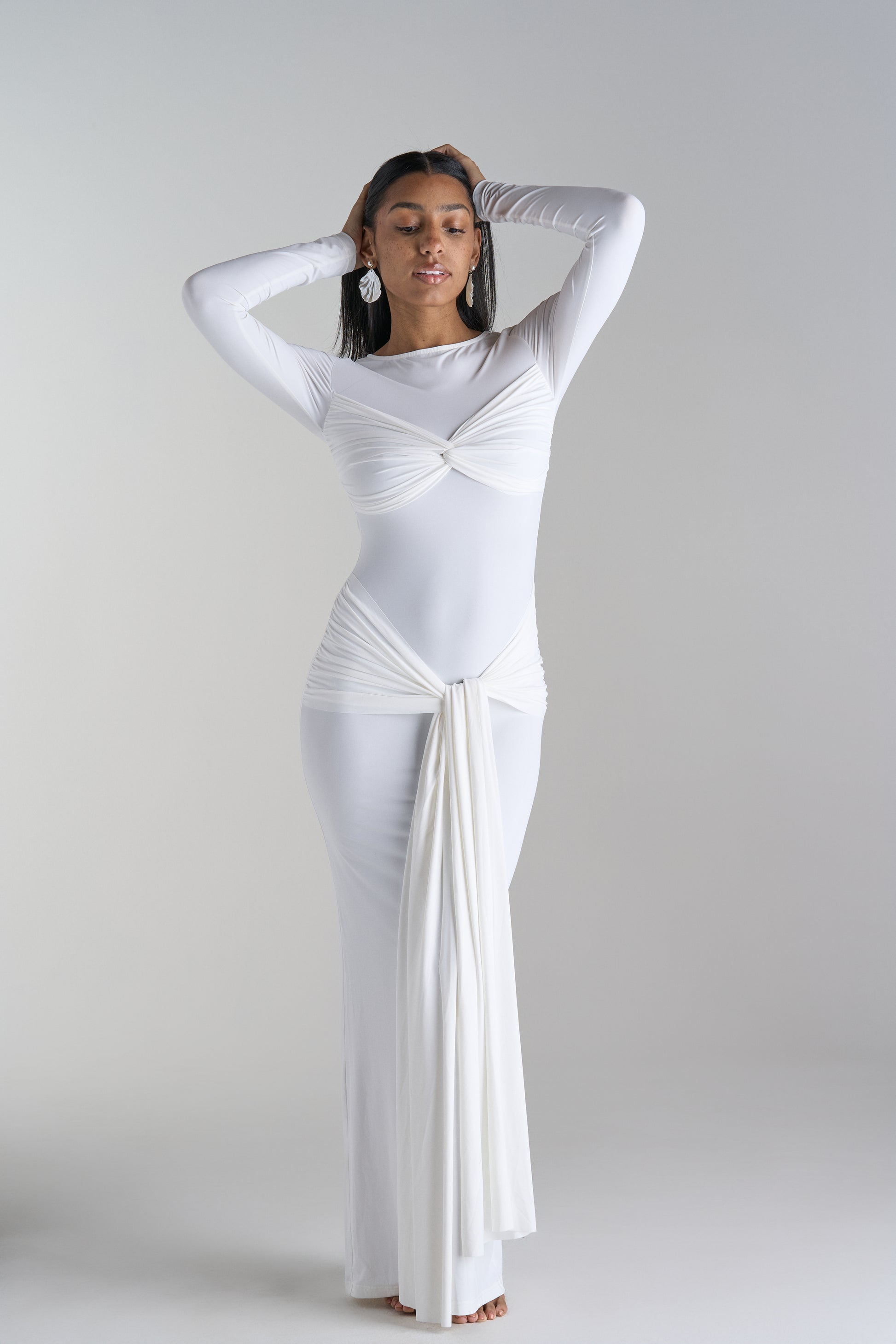 Model in Arielle Long White Dress