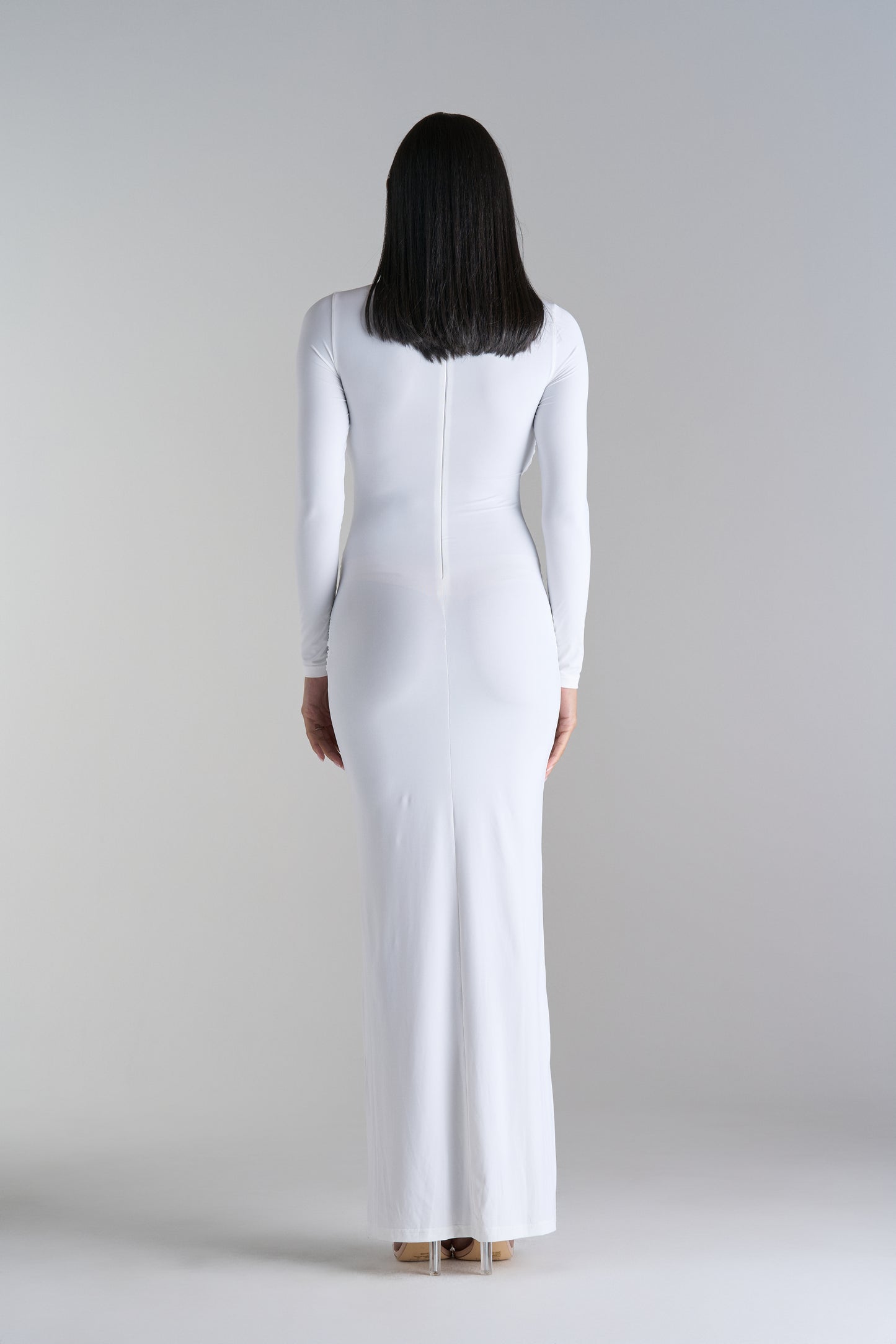 Model in Arielle Long White Dress