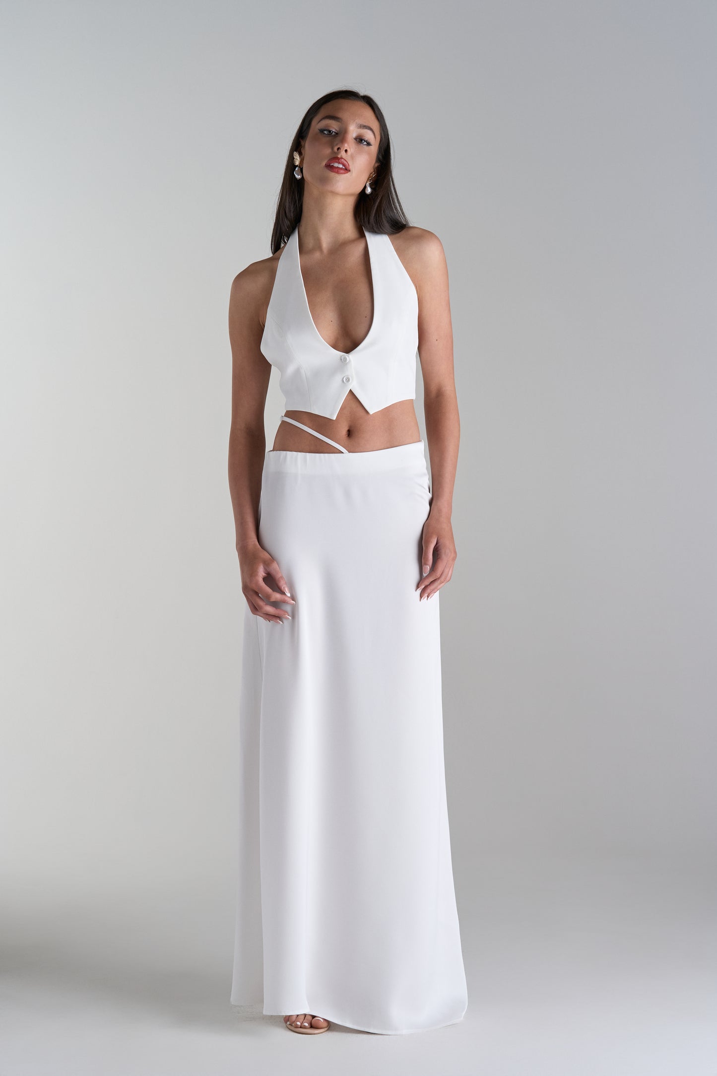 Model Wearing Two Piece Skirt and Top Set