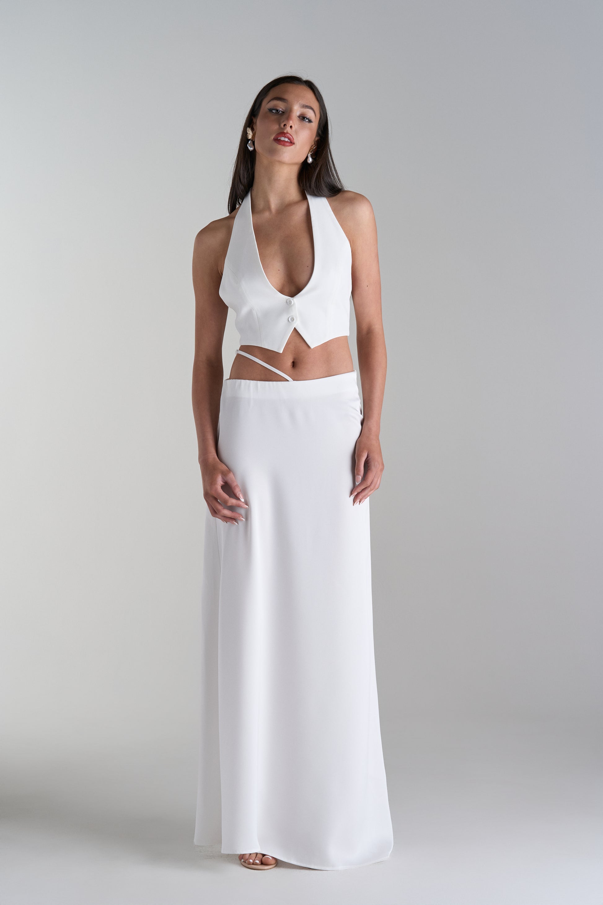 Model Wearing Two Piece Skirt and Top Set