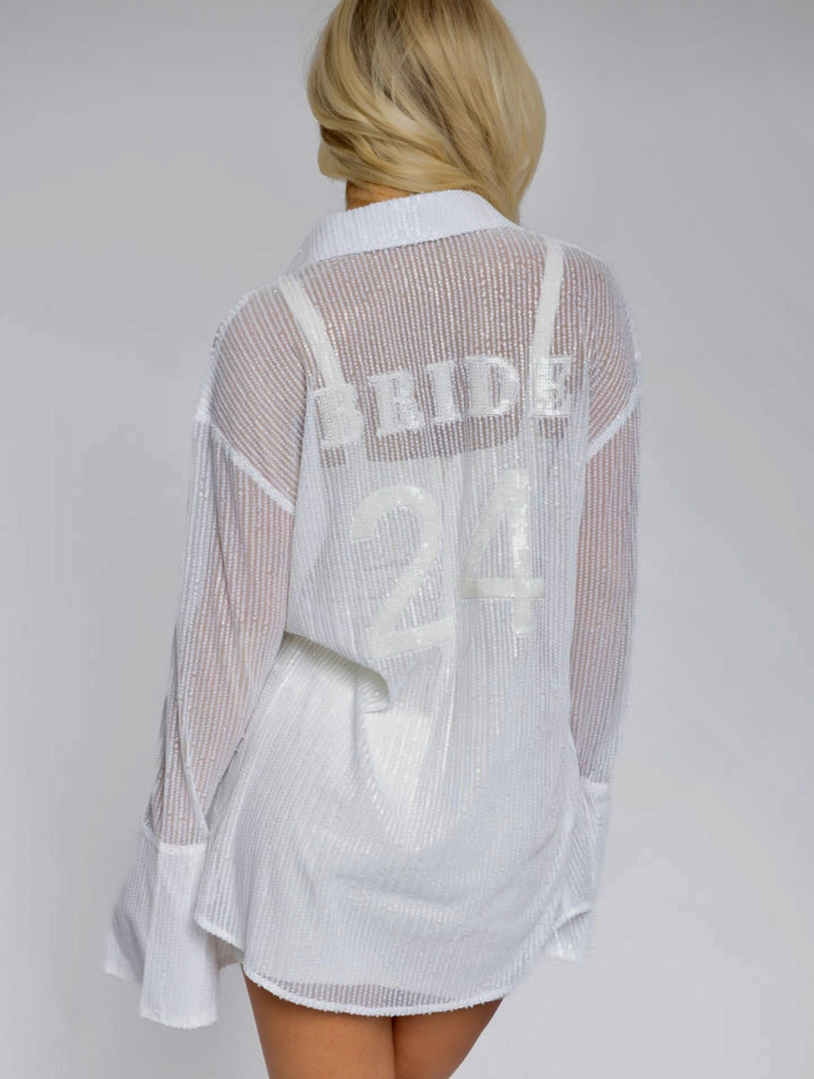 Model is wearing bride overside shirt dress