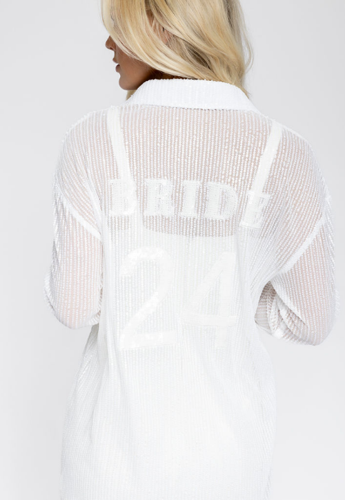 Model is wearing bride overside shirt dress