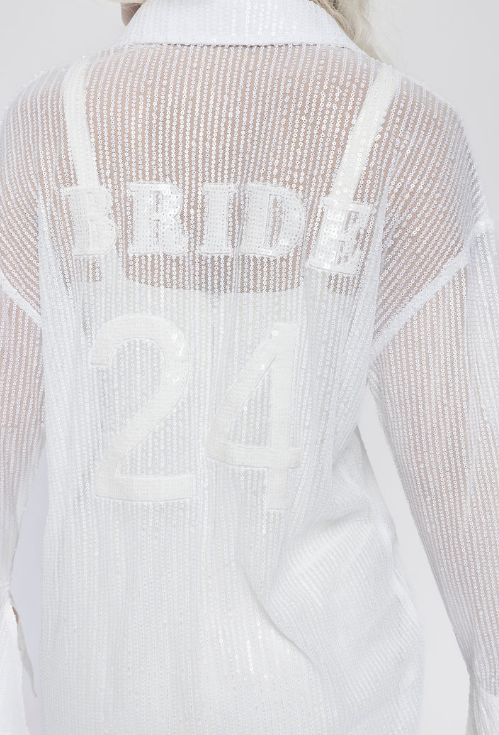 Model is wearing bride overside shirt dress