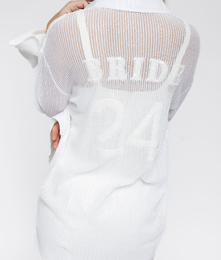 Model is wearing bride overside shirt dress