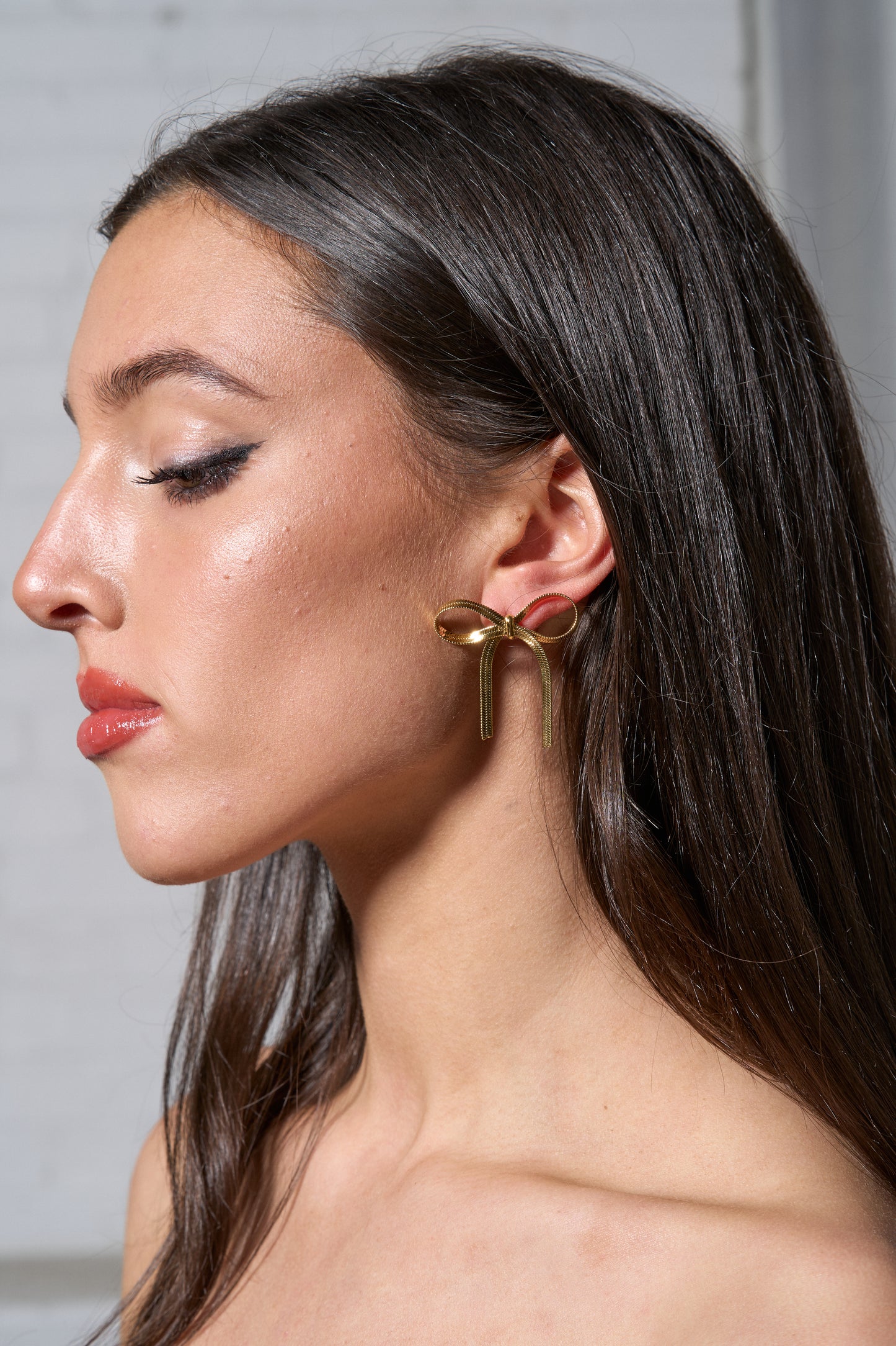 Model in Bow Earring