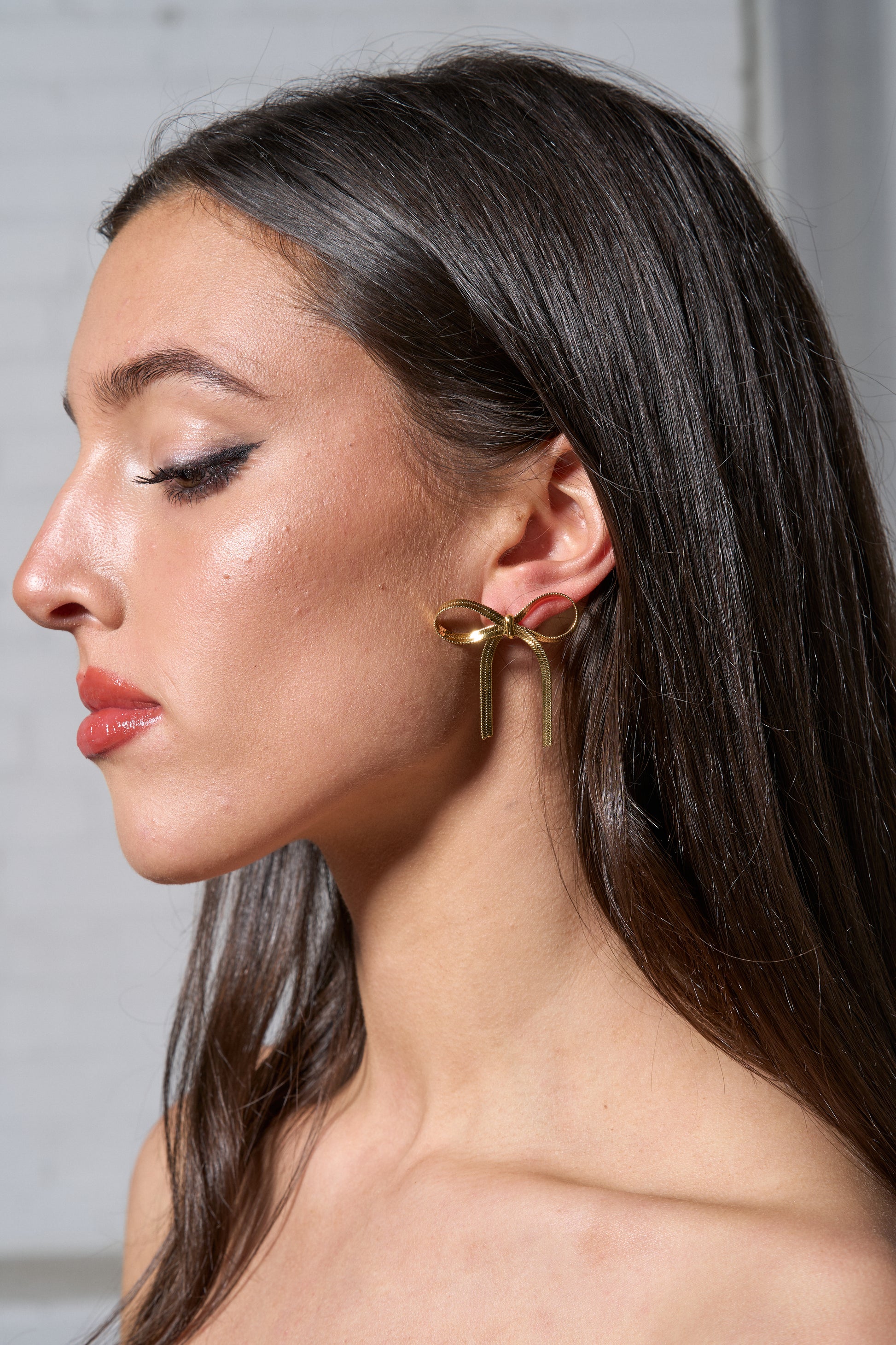 Model in Bow Earring